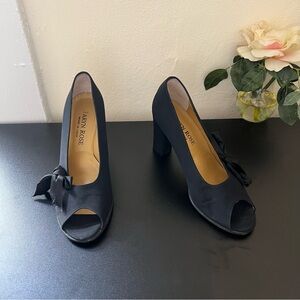 Taryn Rose 80s peep toe heels with bow corset on sides.